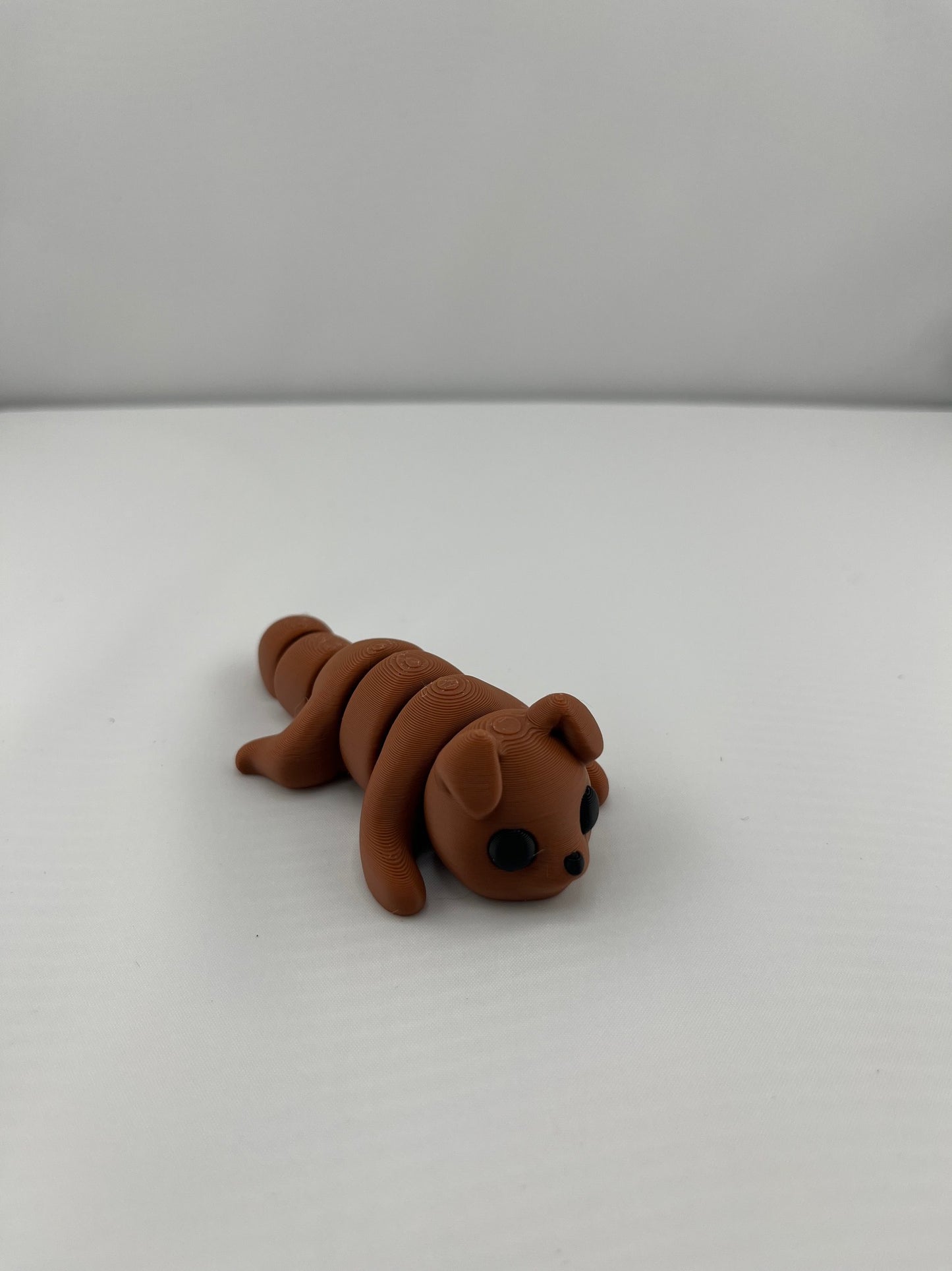 25 Flexi Articulated Brown Dog - Tiny 3D Printed Fidget Toy - Great Gift - Team Mascot - Use as a fund raiser for school - Collect them all - Stress relief - ADHD - Key Chain - Zipper Pull - Pal for your pocket - MADE IN THE USA