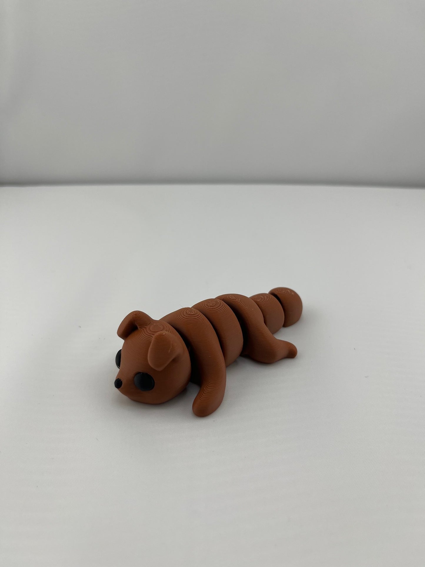 25 Flexi Articulated Brown Dog - Tiny 3D Printed Fidget Toy - Great Gift - Team Mascot - Use as a fund raiser for school - Collect them all - Stress relief - ADHD - Key Chain - Zipper Pull - Pal for your pocket - MADE IN THE USA