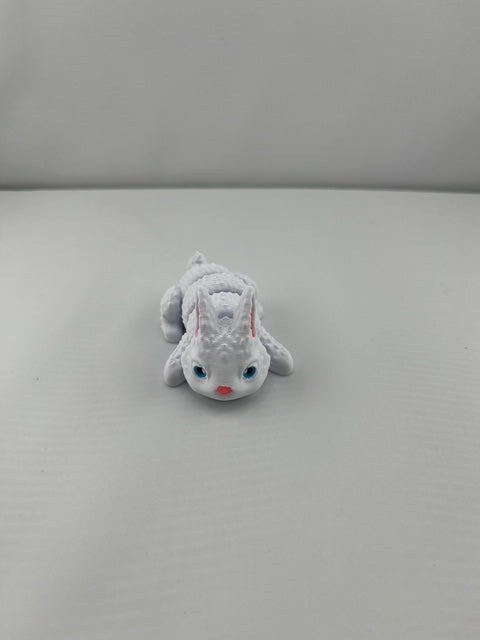 Flexible Articulated Rabbit - Tiny 3D Printed Fidget Toy - Various Sizes Available - Team Mascot - Use as a fund raiser for school - Collect them all - Stress relief - ADHD - Key Chain - Zipper Pull - Pal for your pocket - MADE IN THE USA