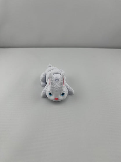 Flexible Articulated Rabbit - Tiny 3D Printed Fidget Toy - Various Sizes Available - Team Mascot - Use as a fund raiser for school - Collect them all - Stress relief - ADHD - Key Chain - Zipper Pull - Pal for your pocket - MADE IN THE USA