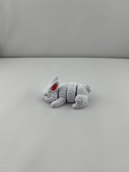 Flexible Articulated Rabbit - Tiny 3D Printed Fidget Toy - Various Sizes Available - Team Mascot - Use as a fund raiser for school - Collect them all - Stress relief - ADHD - Key Chain - Zipper Pull - Pal for your pocket - MADE IN THE USA