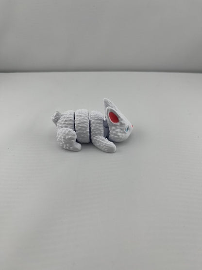 Flexible Articulated Rabbit - Tiny 3D Printed Fidget Toy - Various Sizes Available - Team Mascot - Use as a fund raiser for school - Collect them all - Stress relief - ADHD - Key Chain - Zipper Pull - Pal for your pocket - MADE IN THE USA