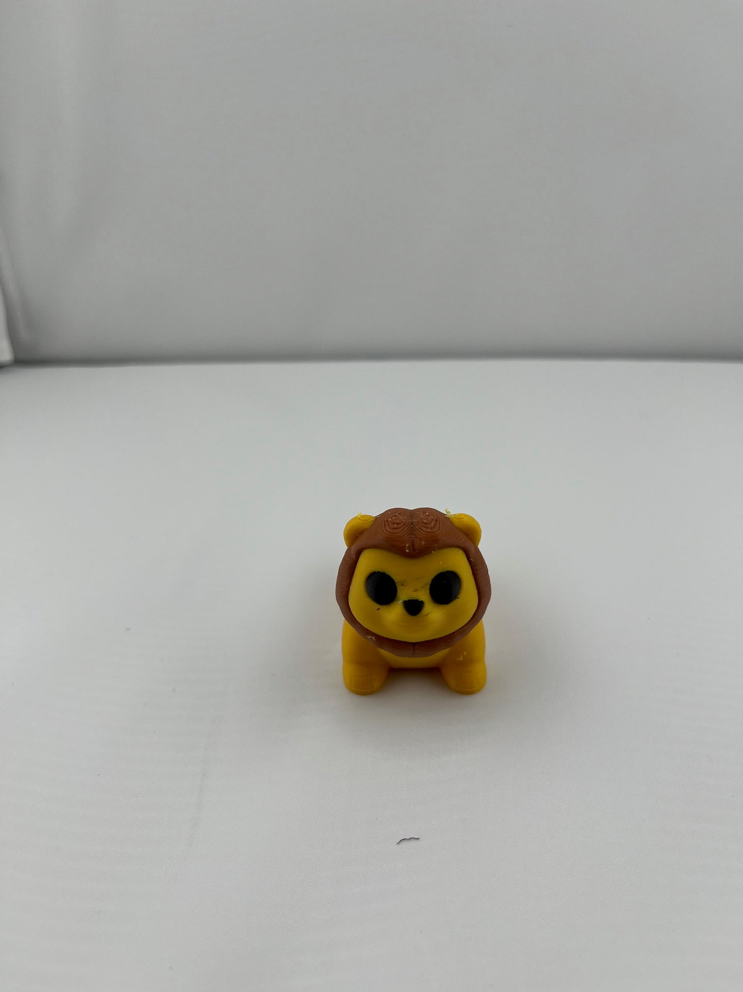 Flexible Articulated Lion - Tiny 3D Printed Fidget Toy - Various Sizes Available - Team Mascot - Use as a fund raiser for school - Collect them all - Stress relief - ADHD - Key Chain - Zipper Pull - Pal for your pocket - MADE IN THE USA