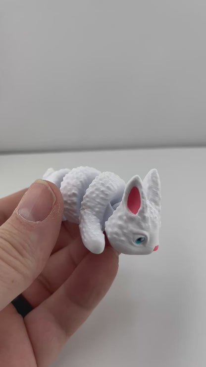 Flexible Articulated Rabbit - Tiny 3D Printed Fidget Toy - Various Sizes Available - Team Mascot - Use as a fund raiser for school - Collect them all - Stress relief - ADHD - Key Chain - Zipper Pull - Pal for your pocket - MADE IN THE USA