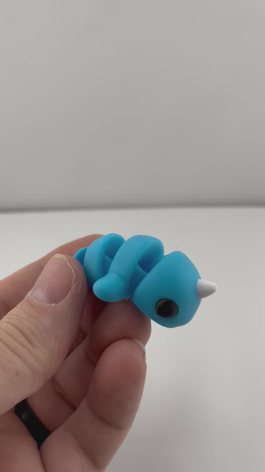 Flexible Articulated Norwal - Tiny 3D Printed Fidget Toy - Various Sizes Available - Team Mascot - Use as a fund raiser for school - Collect them all - Stress relief - ADHD - Key Chain - Zipper Pull - Pal for your pocket - MADE IN THE USA